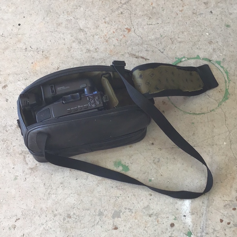 Video camera with storage bag